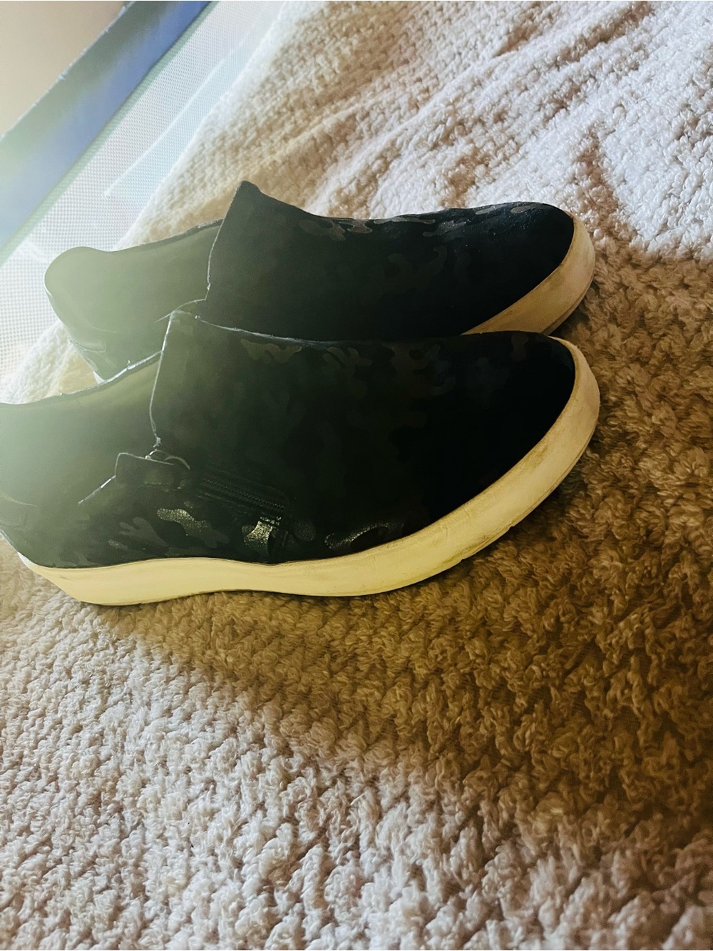 Clarks Women's Black Slip-On Sneakers with White Sole